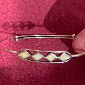 Silver (925) adjustable bangle ,ivory colored stone design.